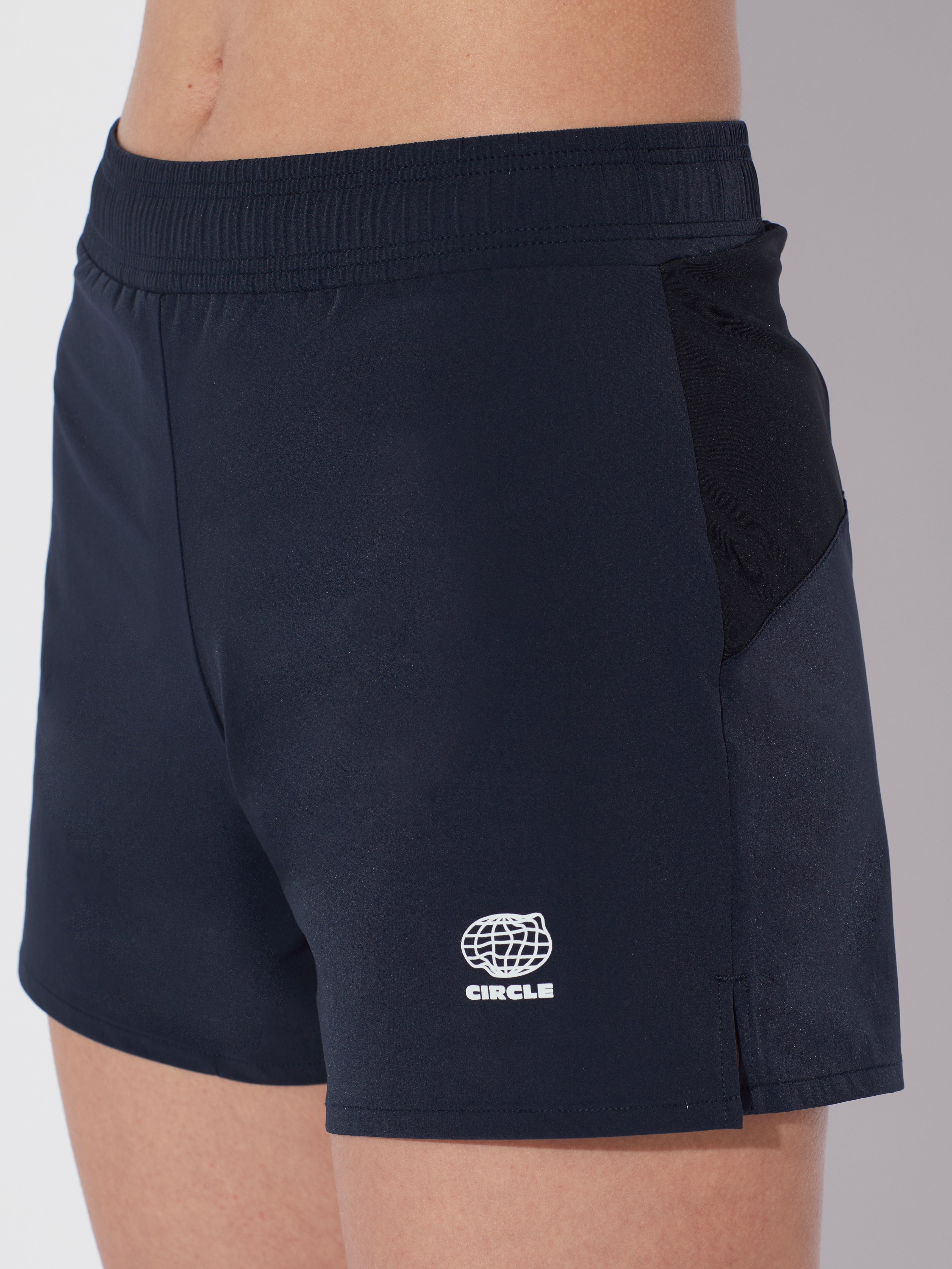 circle-sportswear-short-everystride-femme-double-poche-zipp-e-mati-res-recycl-es image 8